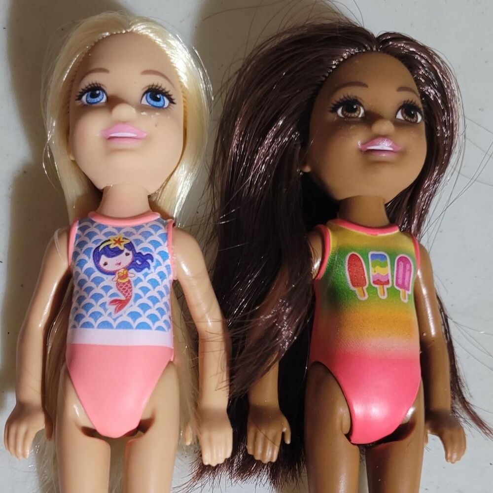 2 Mattel Barbie friends Chelsea dolls.